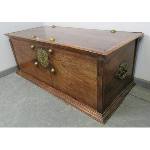 743 - A 19th century hardwood Zanzibar chest, featuring brass boss stud decoration, ornate pierced brass l... 