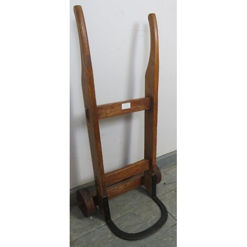 755 - An antique oak miniature sack-barrow, on wooden wheels. 
Condition report: Signs of historic woodwor... 