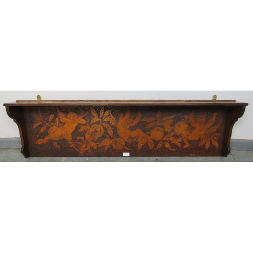 758 - An Arts & Crafts stained pine wall hanging shelf, with pokerwork frieze depicting cherubs and fruit.... 