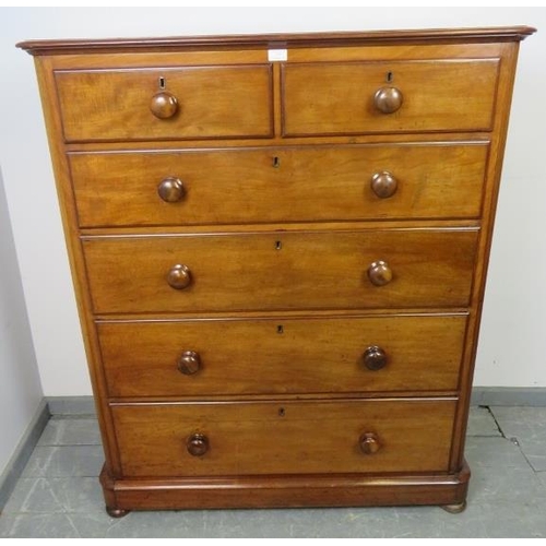 772 - A Victorian mahogany straight front chest of two short over four long graduated drawers with turned ... 