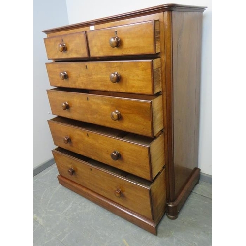 772 - A Victorian mahogany straight front chest of two short over four long graduated drawers with turned ... 