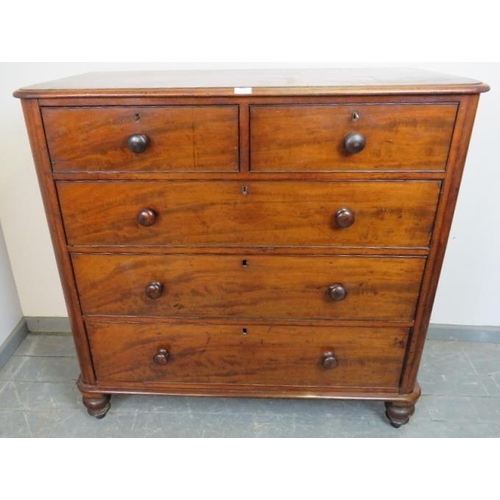 774 - A Victorian mahogany straight-front chest of two short over three long cock-beaded drawers, on turne... 