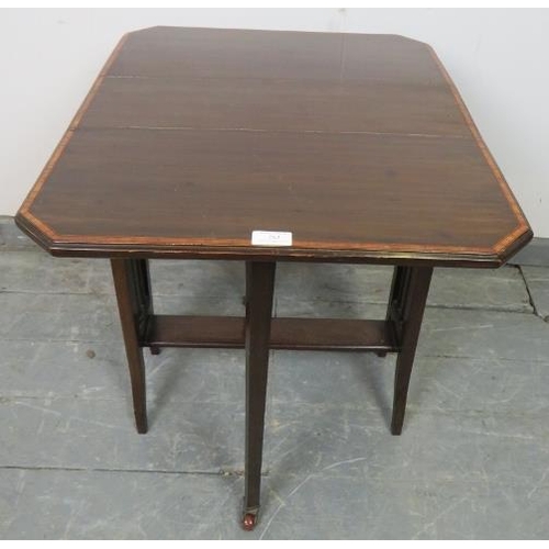 782 - An Edwardian mahogany Sutherland table, with crossbanded inlay, on square supports with ceramic cast... 