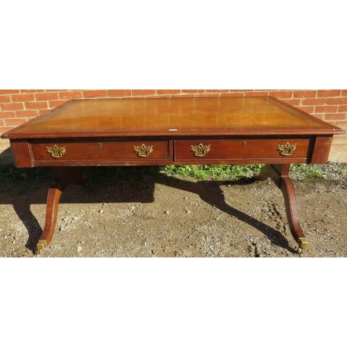 783 - A large 19th century mahogany partners desk, with inset gilt tooled tan leather writing surface, hou... 