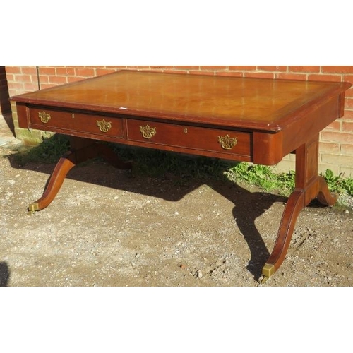 783 - A large 19th century mahogany partners desk, with inset gilt tooled tan leather writing surface, hou... 