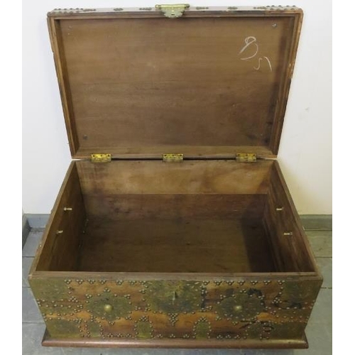 790 - A vintage hardwood Zanzibar chest of small proportions, with hand hammered pierced brass decoration ... 