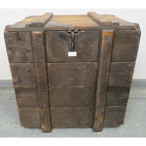 799 - A vintage oak luggage chest with internal candle box, cast iron fittings and rope handles to either ... 