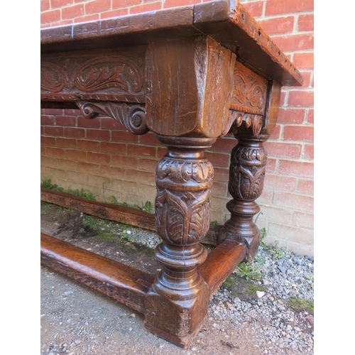 801 - An Elizabethan and later oak refectory table of exceptional colour and patina, the planked top with ... 