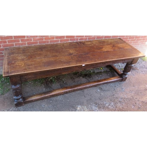 801 - An Elizabethan and later oak refectory table of exceptional colour and patina, the planked top with ... 