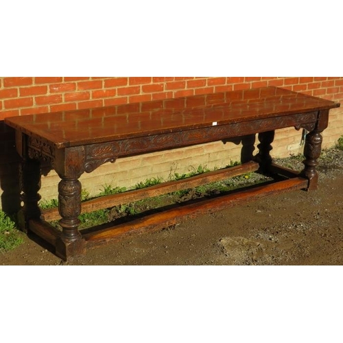 801 - An Elizabethan and later oak refectory table of exceptional colour and patina, the planked top with ... 