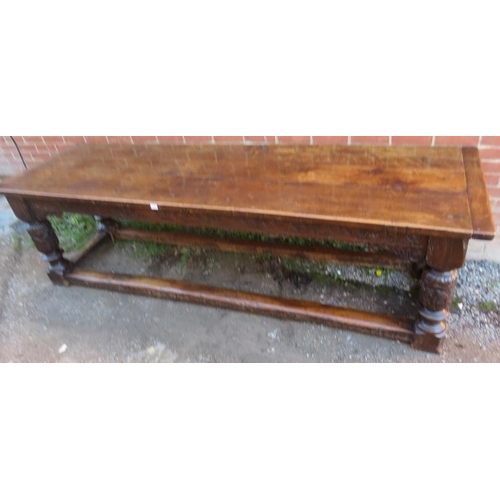 801 - An Elizabethan and later oak refectory table of exceptional colour and patina, the planked top with ... 