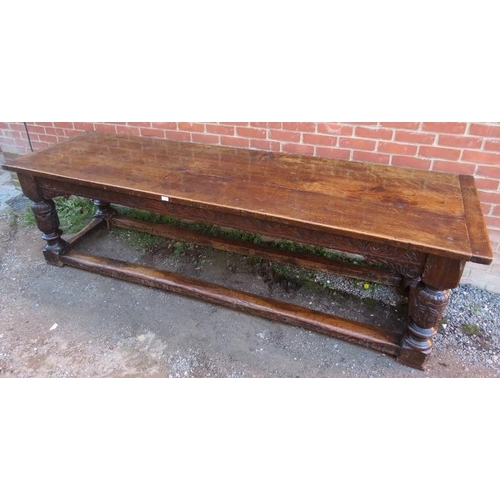 801 - An Elizabethan and later oak refectory table of exceptional colour and patina, the planked top with ... 