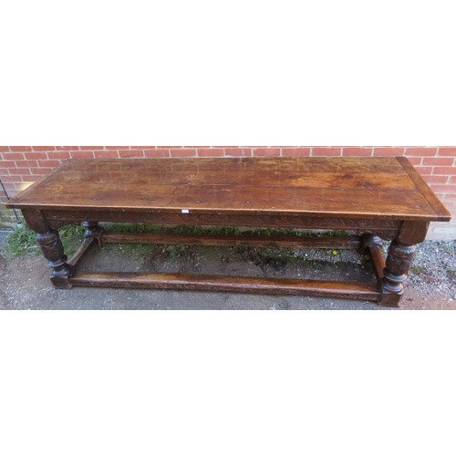 801 - An Elizabethan and later oak refectory table of exceptional colour and patina, the planked top with ... 