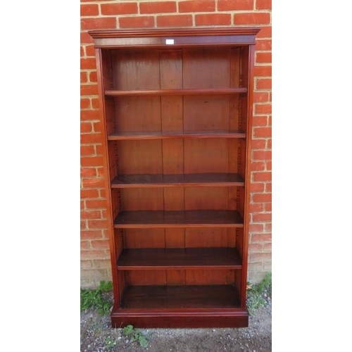 804 - A Victorian mahogany tall open bookcase of five height adjustable shelves, on a plinth base. 
Condit... 