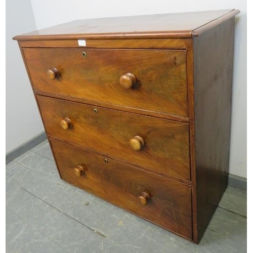 806 - A Victorian mahogany chest of three long cock-beaded drawers with the original turned wooden knob ha... 