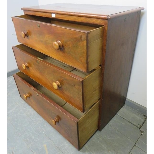 806 - A Victorian mahogany chest of three long cock-beaded drawers with the original turned wooden knob ha... 