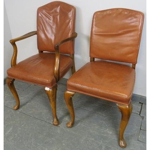 815 - A pair of antique walnut His and Hers desk chairs, one a carver, upholstered in distressed tan leath... 