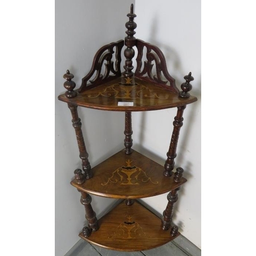 825 - A Victorian walnut three-tier corner whatnot with turned uprights and marquetry inlay. 
Condition re... 