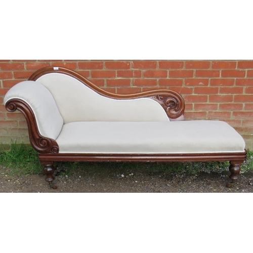 830 - A Victorian mahogany show-wood chaise longue, with scrolled and pierced backrest, reupholstered in a... 