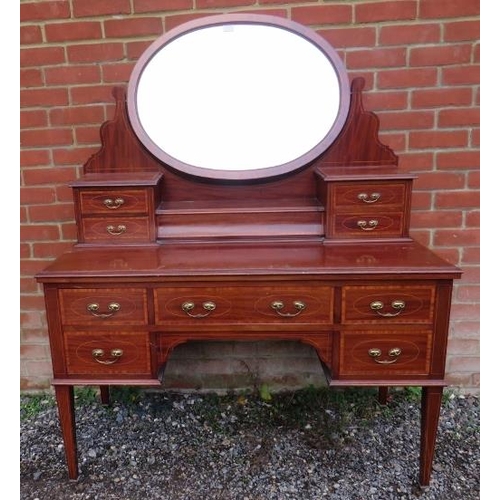 831 - An Edwardian mahogany Regency Revival, c.1900, dressing table featuring crossbanded satin walnut inl... 