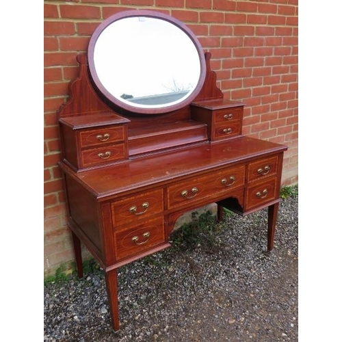 831 - An Edwardian mahogany Regency Revival, c.1900, dressing table featuring crossbanded satin walnut inl... 