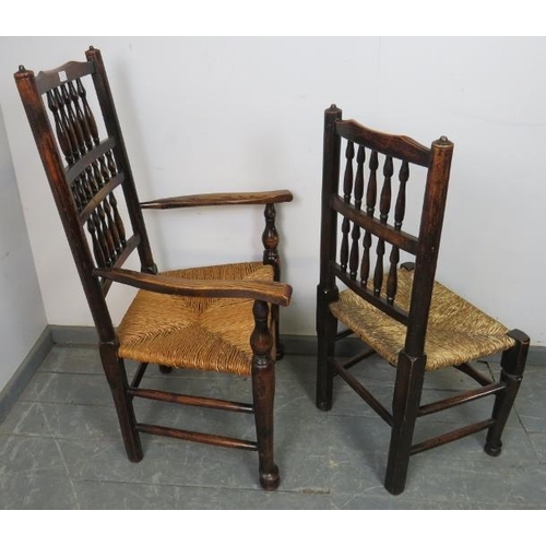 834 - Five (4+1) 19th century oak Lancashire spindle back chairs with rush seats, on turned front supports... 