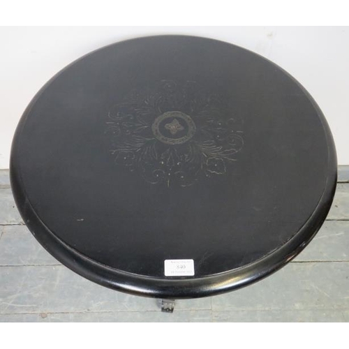 840 - An Aesthetic Movement ebonised circular occasional table, with three canted turned uprights and cent... 