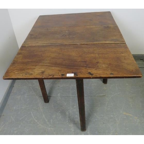 842 - An 18th century mahogany drop-leaf cottage dining table, on inner-chamfered square supports with ree... 