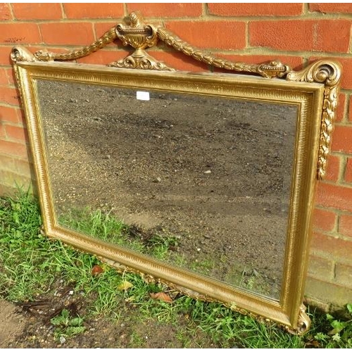 843 - A giltwood rectangular bevelled wall mirror in the Neo-Classical taste, with urn finial flanked by s... 