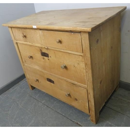 863 - An Edwardian stripped pine chest of two short over two long graduated drawers with turned knob handl... 