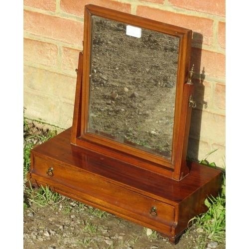 867 - A Georgian mahogany swing vanity mirror with brass finials, above a box base with single drawer, on ... 