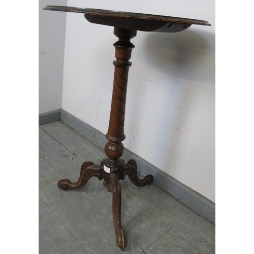 869 - A 19th century walnut circular occasional table, featuring marquetry inlay, on a spiral carved taper... 