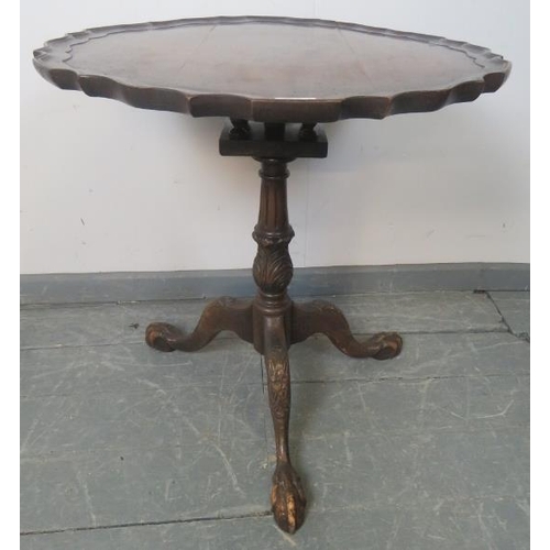 883 - A George III style mahogany tilt-top ‘birdcage’ table with piecrust edge and reeded column, on carve... 