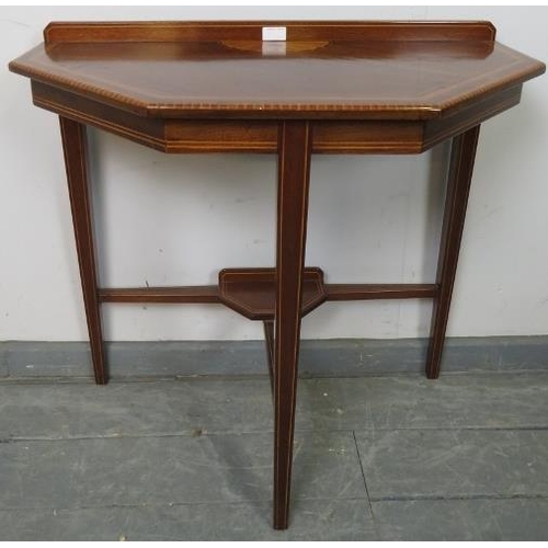 884 - An Edwardian mahogany console table strung with satinwood and featuring batwing inlay, on tapering s... 