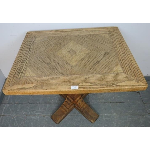 888 - A vintage light oak pedestal table, on a tapering square pedestal with quatreform base. 
Condition r... 