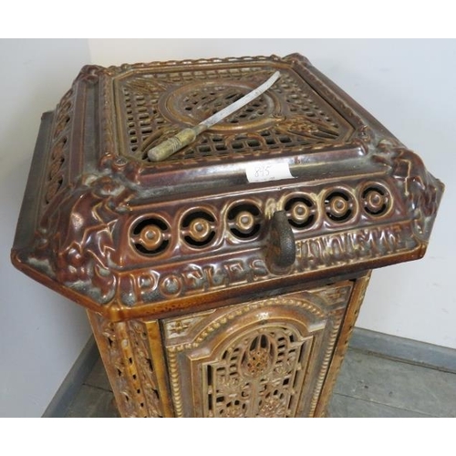 895 - An antique French cast iron treacle glaze enamel multi-fuel stove by Poeles Nanquette St. Michel, wi... 