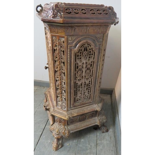 895 - An antique French cast iron treacle glaze enamel multi-fuel stove by Poeles Nanquette St. Michel, wi... 