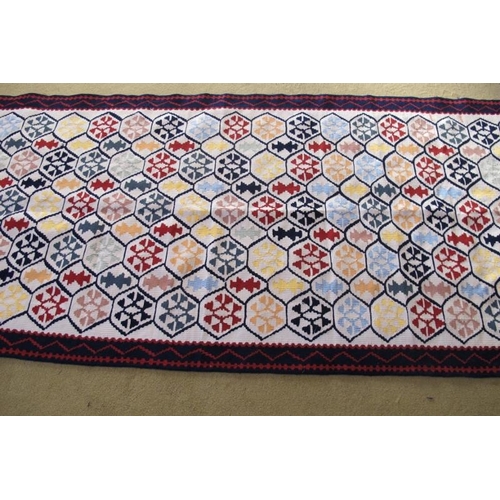 907 - North West Persian Senneh Kilim. Good condition, vibrant colours. 250cm x 80cm.