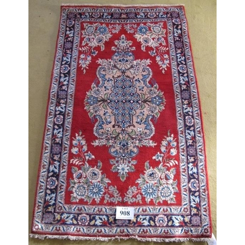 908 - Central Persian Qum rug. Pastel shades of floral, pattern on red ground. Good condition. 170cm x 108... 