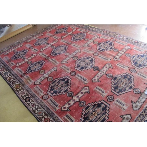 914 - South West Persian Lori carpet. All over repeat pattern on pale red ground. Good even wear and colou... 