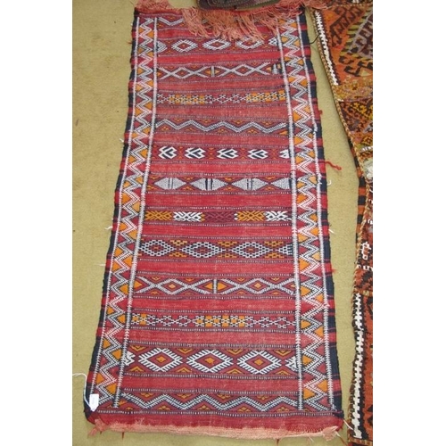 922 - A large late 19th-early 20th century Persian saddle bag (very nice), a small Persian rug and a long ... 