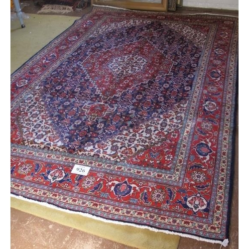 926 - A fine Persian Tabriz carpet, blue, red, cream in excellent condition and good colour. 311cm x 205cm... 