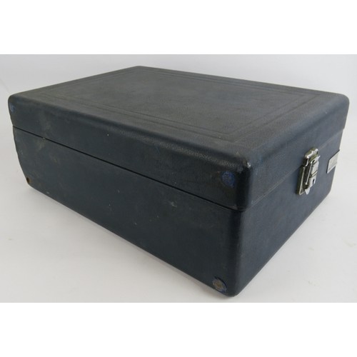 185 - A vintage portable HMV gramophone in blue leatherette case. 41cm x 29cm.
Condition report: Winds and... 