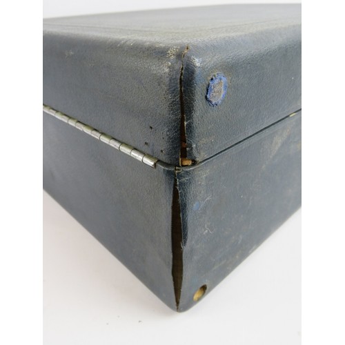 185 - A vintage portable HMV gramophone in blue leatherette case. 41cm x 29cm.
Condition report: Winds and... 