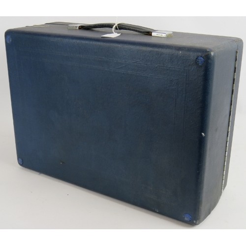 185 - A vintage portable HMV gramophone in blue leatherette case. 41cm x 29cm.
Condition report: Winds and... 