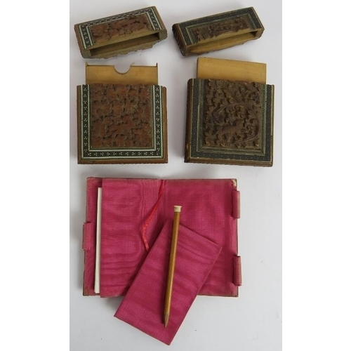 260 - Two Indian carved wood card cases with micro mosaic borders and a carved wood aide memoire with fitt... 