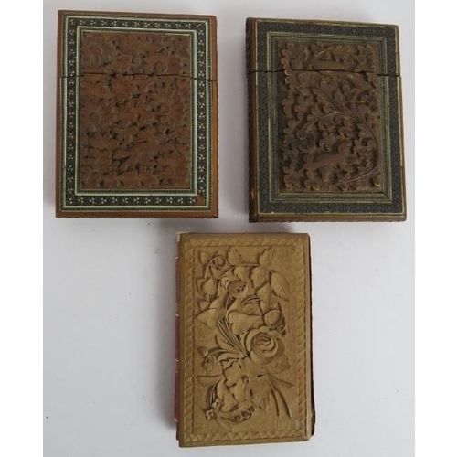 260 - Two Indian carved wood card cases with micro mosaic borders and a carved wood aide memoire with fitt... 