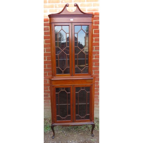 881 - An Edwardian mahogany glazed tall freestanding corner unit, inlaid and crossbanded and strung with b... 