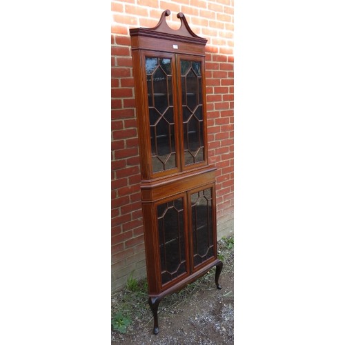 881 - An Edwardian mahogany glazed tall freestanding corner unit, inlaid and crossbanded and strung with b... 