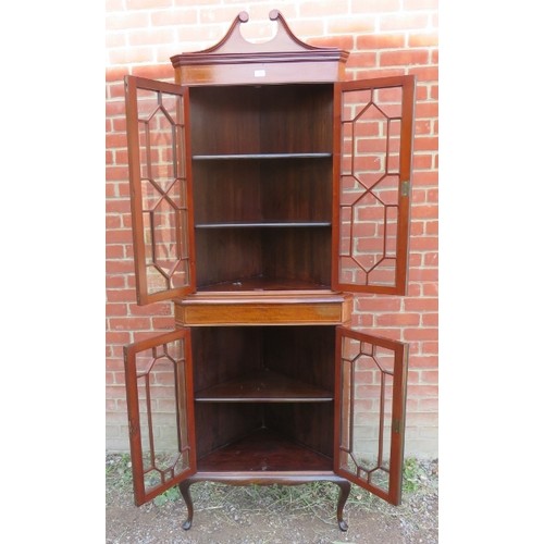 881 - An Edwardian mahogany glazed tall freestanding corner unit, inlaid and crossbanded and strung with b... 